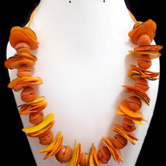 WHOLESALE TAGUA CHIPS NECKLACES WITH BOMBONA SEEDS 